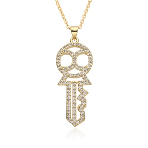 Elegant gold hollow key pendant necklace with micro-pave cubic zirconia on white background