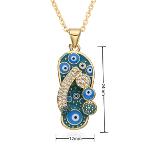 Close-up of flip-flop pendant with evil eye pattern and size marks 24mm by 12mm