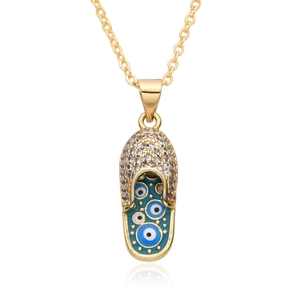 Golden flip-flop pendant necklace with blue evil eye enamel and micro-pave crystals