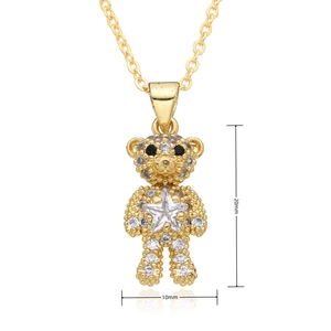 Makro-Detail des Teddybär-Anhängers mit Maßen von 20 mm Höhe und 10 mm Breite in Gold
