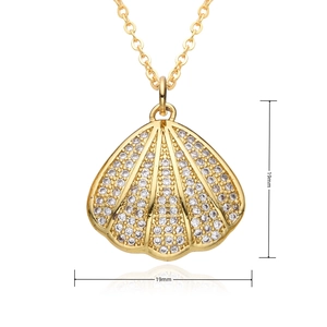 Detail of 19mm mermaid shell pendant with crystals on golden chain with reflection