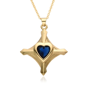 Golden necklace with star cross pendant featuring a blue heart zircon and mirror reflection
