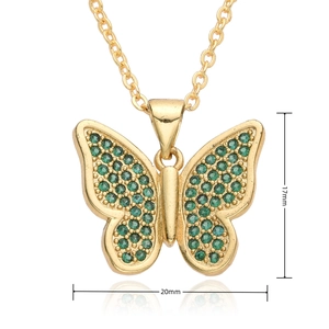 Detail view of 18K gold butterfly pendant with green zircons and size measurements