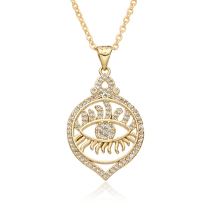 Détail macro du pendentif œil maléfique doré avec cristaux de zircon blancs brillants