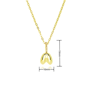 Detail view of gold fortune cookie pendant with dimensions 19mm by 10mm and zircon inlay