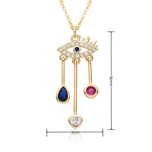 Détail du pendentif œil de démon avec pierres bleues, blanches et rouges et dimensions