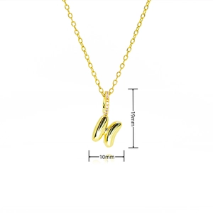 Detail showing dimensions of a 19mm x 10mm golden butterfly pendant with small zircons