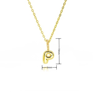 Macro detail of gold bubble letter P pendant with zircon inlay and 19x9mm dimensions