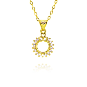 Detail of gold circular pendant with micro-paved zircons and heart-shaped bail connector