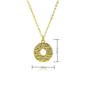 Macro shot showing 21mm by 18mm square sun pendant with hammered texture and gold finish