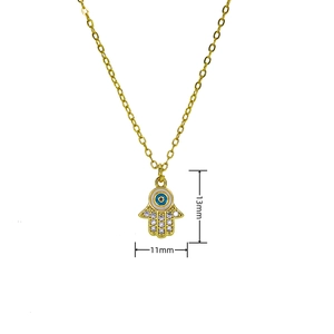 Macro detail of gold-plated Hamsa Hand pendant with Evil Eye and zircon pavé 13mm