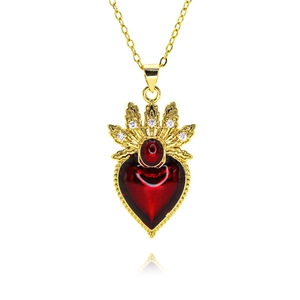 French palace style necklace with red heart pendant and gold metal detailing