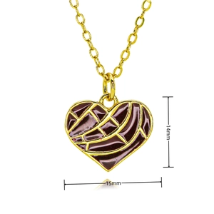 Detail showing red enamel heart pendant dimensions 14mm by 15mm with gold mesh pattern