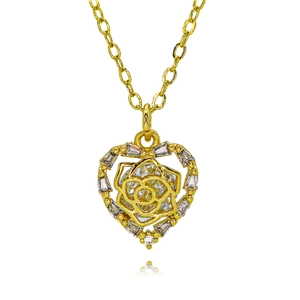 Close-up of golden heart pendant with a detailed rose center and sparkling cubic zirconia