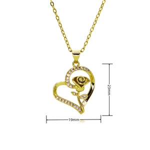 Detail shot of a gold heart pendant with a rose and zircon stones including 23mm dimensions