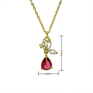 Elegant gold butterfly necklace with zircon stones and a red pear-shaped pendant