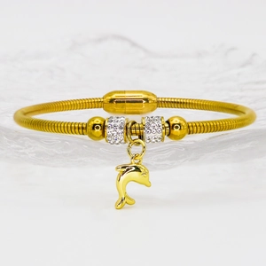 Golden snake chain bracelet with sparkling crystal beads and a dolphin pendant charm
