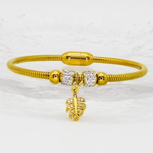 Gold snake chain bracelet with magnetic clasp, pavé crystal beads and hollow leaf pendant