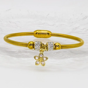 Elegant gold snake chain bracelet with sparkling rhinestone flower charms and magnetic clasp