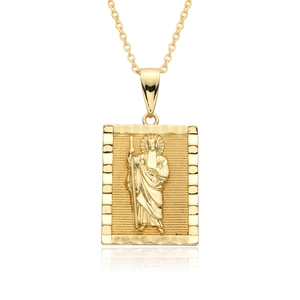 Close-up of 18k gold plated religious pendant with intricate saint relief carving