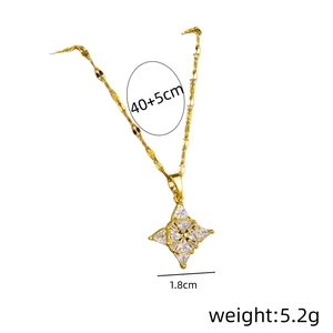 Elegante collar de acero de titanio dorado con colgante de estrella y cristales