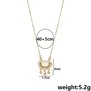 Golden Ruyi lock necklace in titanium steel with zircon and white gemstone pendant