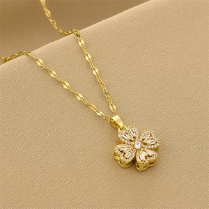 Elegant gold four-leaf clover pendant necklace with sparkling micro-pave crystals for women