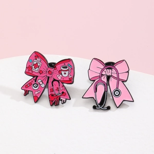 Broches en émail rose en forme de nœud avec stéthoscope pour infirmières et médecins