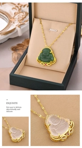 Detailed macro view of laughing Buddha pendants with gold inlay in jewelry boxes