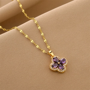 Elegant gold titanium steel necklace with purple zircon four-leaf clover flower pendant