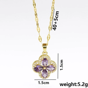 Golden titanium necklace with a violet zircon clover pendant on a white background