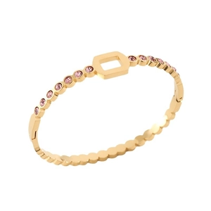 Gold hollow honeycomb bangle with pink round gemstones and a side mechanical clasp