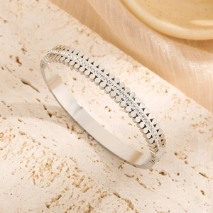 Silver plated stainless steel bracelet with double row round diamonds and scalloped edges