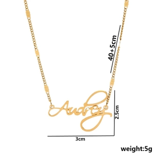 Custom gold Audrey name necklace in cursive script with 40+5cm adjustable chain