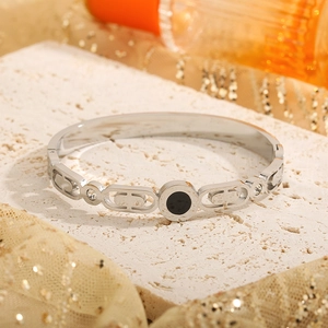 Polished silver titanium steel bangle with black shell center and sparkling zircons