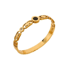 Golden hollow link bracelet with black shell inlay and sparkling cubic zirconia stones