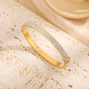 Elegant gold titanium steel bracelet with three rows of sparkling zircon stones