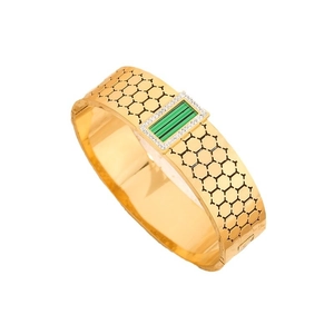 Retro honeycomb gold-plated bangle with a rectangular green gem and white diamonds