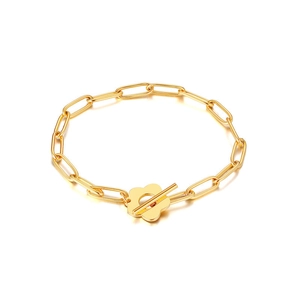 Elegant gold paperclip chain bracelet with a decorative plum blossom OT toggle clasp