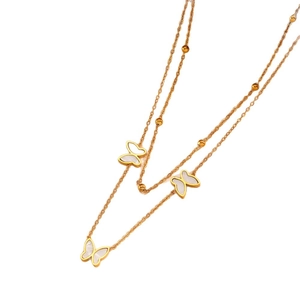 Double-layered gold titanium steel butterfly necklace with white shell inlay on white background