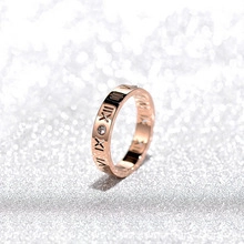 Polished 18k rose gold plated titanium steel ring with roman numerals and diamond inlay