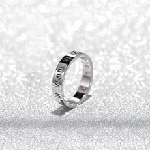 Silver Roman numeral ring in stainless steel with crystal accent on glitter background