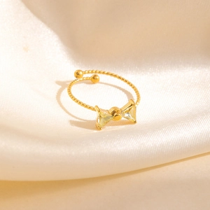 Bague nœud dorée ajustable avec zircons jaunes et anneau à texture torsadée