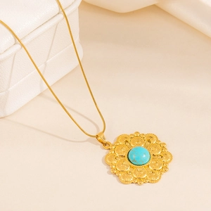 Golden flower necklace with turquoise stone and vintage round petal pendant detail
