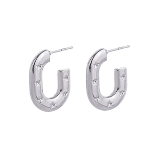 Detail of silver U-shaped earrings featuring a star pattern and polished metal finish