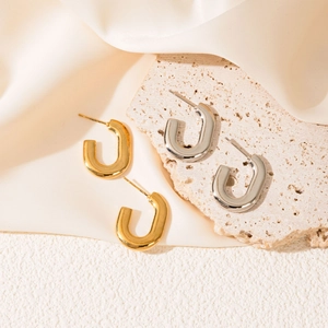 Minimalist U-shaped geometric stainless steel earrings in polished gold and silver finishes