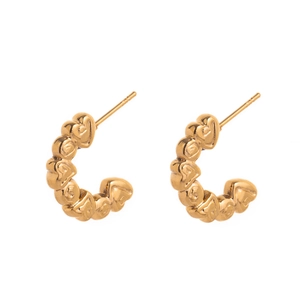 Detailed view of C-shaped golden earrings with textured 3D heart-linked pattern design