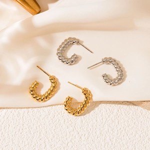 Twisted croissant hoop earrings in gold and silver stainless steel finish set
