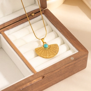 Vintage gold fan-shaped flower pendant necklace with turquoise stone inlay on silk