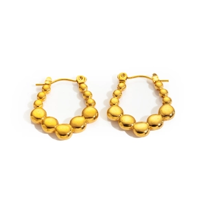 Detailed view of gold-plated 18K stainless steel hoop earrings with textured bead surface